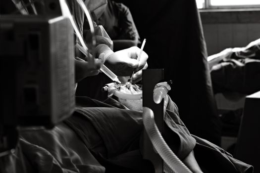 Surgical team reviewing safety protocols in operating room
