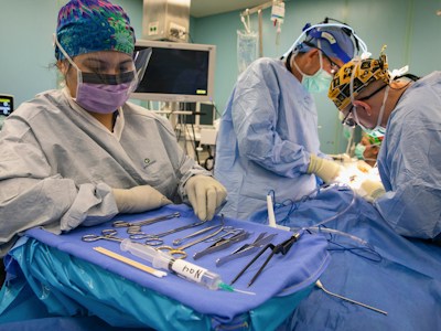 Surgeon performing minimally invasive laparoscopic procedure